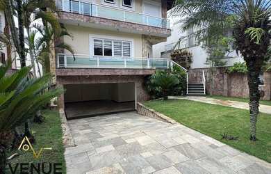 Imagem: A casa em condomínio possui 4 Dormitórios, 4 Banheiros, 4