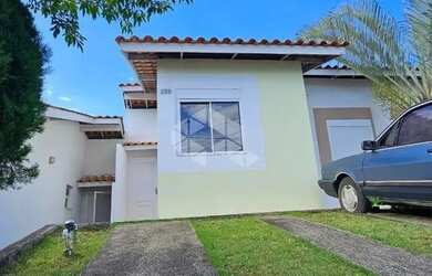 Imagem: A casa em condomínio possui 2 Dormitórios, 1 Banheiro, 2 Vagas