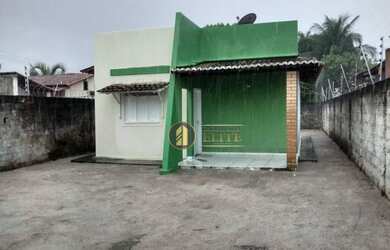 Imagem: A casa possui 2 Dormitórios, 1 Banheiro, 2 Vagas na garagem