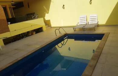 Imagem: A casa em condomínio possui 4 Dormitórios, 4 Banheiros, 2