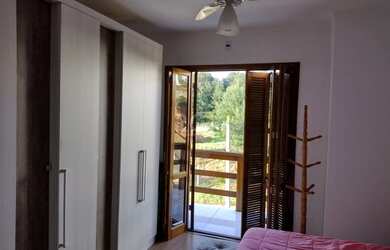 Imagem 7: Casa em Guarujá. Churrasqueira, Lareira, 2 Vagas na garageme3 Dormitórios