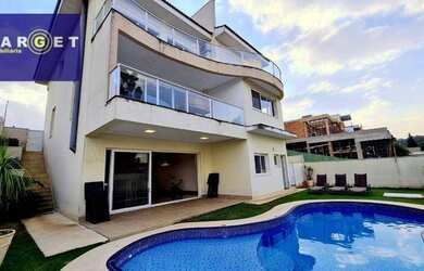 Imagem: A casa em condomínio possui 4 Dormitórios, 5 Banheiros, 4