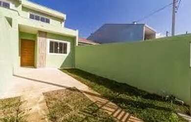 Imagem: A casa possui 3 Dormitórios, 2 Banheiros, 2 Vagas na garagem