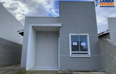 Imagem: A casa em condomínio possui 2 Dormitórios, 1 Banheiro, 2 Vagas