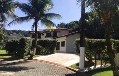 Imagem: A casa possui 4 Dormitórios, 5 Banheiros, 5 Vagas na garagem