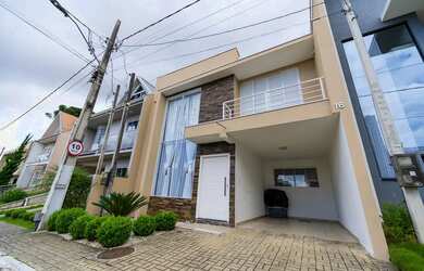 Imagem: A casa em condomínio possui 2 Dormitórios, 3 Banheiros, 2