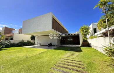 Imagem: A casa em condomínio possui 4 Dormitórios, 4 Banheiros, 640m²