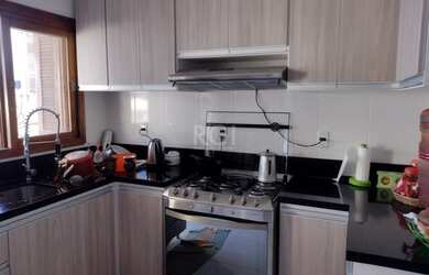 Imagem 4: Casa em Guarujá. Churrasqueira, Lareira, 2 Vagas na garageme3 Dormitórios