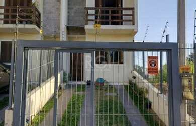 Imagem 1: Casa em Guarujá. Churrasqueira, Lareira, 2 Vagas na garageme3 Dormitórios