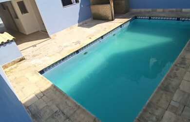 Imagem: A casa possui 4 Dormitórios, 4 Banheiros, 4 Vagas na garagem