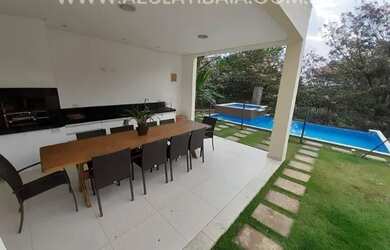 Imagem: A casa em condomínio possui 4 Dormitórios, 5 Banheiros, 4