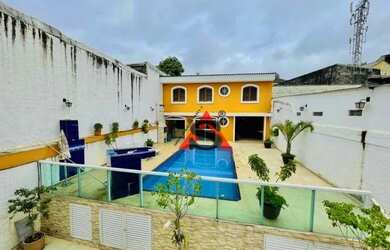 Imagem: A casa possui 5 Dormitórios, 5 Banheiros, 5 Vagas na garagem