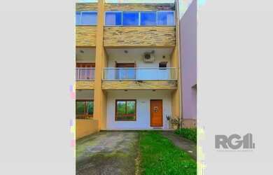 Imagem: A casa possui 3 Dormitórios, 3 Banheiros, 2 Vagas na garagem