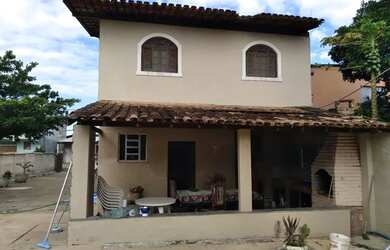 Imagem: A casa possui 5 Dormitórios, 3 Banheiros, 5 Vagas na garagem