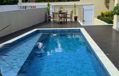 Imagem: A casa possui 3 Dormitórios, 4 Banheiros, 4 Vagas na garagem