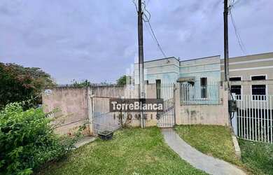 Imagem: A casa possui 3 Dormitórios, 1 Banheiro, 3 Vagas na garagem