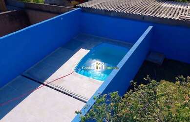 Imagem: A casa possui 2 Dormitórios, 2 Banheiros, 2 Vagas na garagem