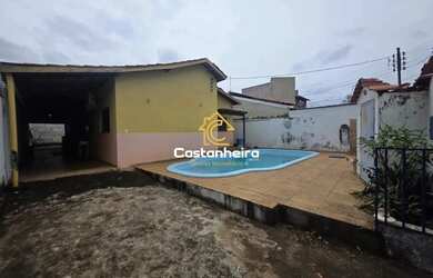 Imagem: A casa possui 5 Dormitórios, 3 Banheiros, 4 Vagas na garagem