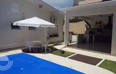 Imagem: A casa possui 4 Dormitórios, 5 Banheiros, 2 Vagas na garagem