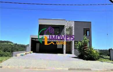 Imagem: A casa em condomínio possui 3 Dormitórios, 3 Banheiros, 4