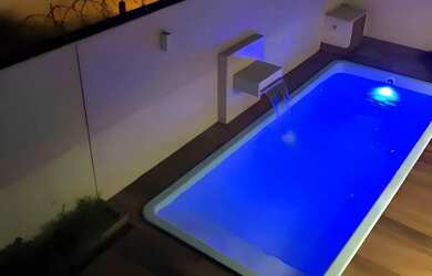 Imagem: A casa possui 4 Dormitórios, 4 Banheiros, 2 Vagas na garagem