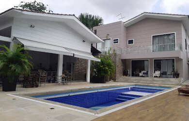 Imagem: A casa em condomínio possui 5 Dormitórios, 5 Banheiros, 5