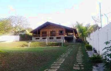 Imagem: A casa possui 4 Dormitórios, 3 Banheiros, 5 Vagas na garagem