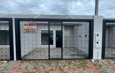 Imagem: A casa possui 3 Dormitórios, 1 Banheiro, 2 Vagas na garagem