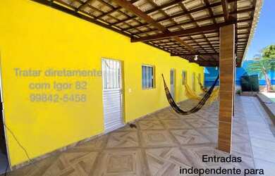 Imagem: A casa possui 3 Dormitórios, 5 Banheiros, 4 Vagas na garagem