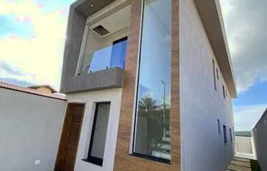 Imagem: A casa possui 3 Dormitórios, 4 Banheiros, 2 Vagas na garagem