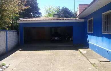 Imagem: A casa possui 5 Dormitórios, 3 Banheiros, 3 Vagas na garagem