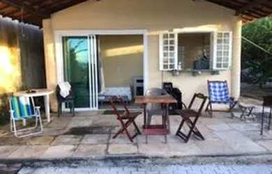 Imagem: A casa possui 2 Dormitórios, 4 Vagas na garagem e está localizado