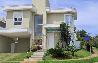 Imagem: A casa em condomínio possui 4 Dormitórios, 5 Banheiros, 4