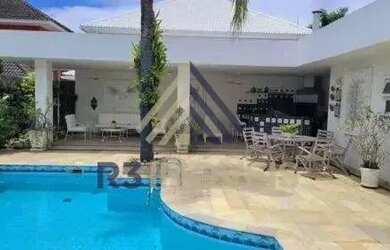 Imagem: A casa em condomínio possui 4 Dormitórios, 5 Banheiros, 4