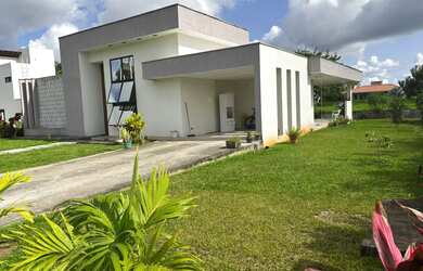 Imagem: A casa possui 4 Dormitórios, 5 Banheiros, 4 Vagas na garagem