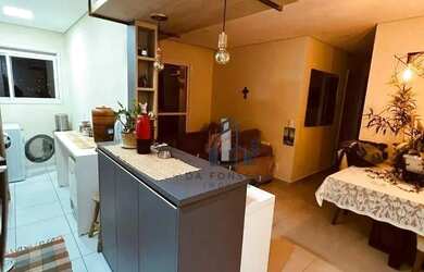 Imagem: O apartamento possui 2 Dormitórios, 1 Banheiro, 1 Vaga na garagem