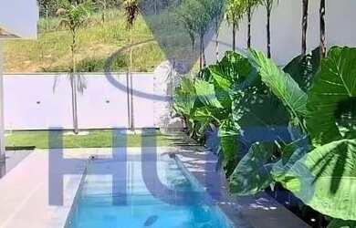 Imagem: A casa possui 3 Dormitórios, 4 Banheiros, 4 Vagas na garagem