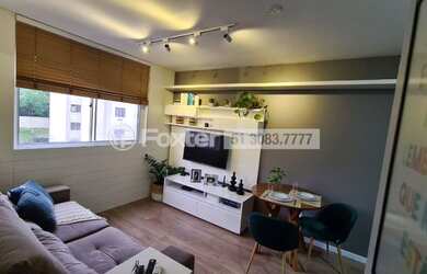 Imagem: O apartamento possui 2 Dormitórios, 1 Banheiro, 1 Vaga na garagem