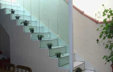 Imagem: A casa possui 2 Dormitórios, 2 Banheiros, 1 Vaga na garagem