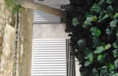 Imagem: A casa possui 2 Dormitórios, 2 Banheiros e 1 Vaga na garagem