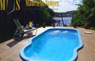 Imagem: A casa em condomínio possui 4 Dormitórios, 4 Banheiros, 4