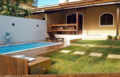 Imagem: A casa possui 3 Dormitórios e está localizado em Barra do