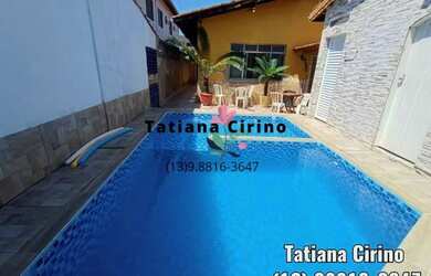 Imagem: A casa possui 2 Dormitórios e 2 Vagas na garagem e está localizado