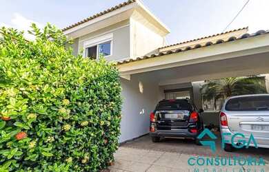 Imagem: A casa possui 3 Dormitórios, 4 Banheiros, 4 Vagas na garagem