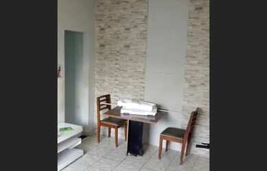 Imagem: A casa possui 2 Dormitórios, 1 Banheiro, 1 Vaga na garagem