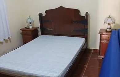 Imagem: A casa possui 3 Dormitórios, 2 Banheiros, 3 Vagas na garagem