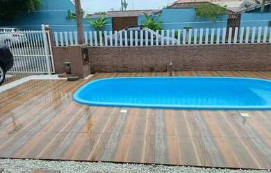 Imagem: A casa possui 2 Dormitórios, 2 Banheiros, 2 Vagas na garagem