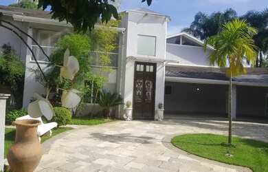 Imagem: A casa em condomínio possui 4 Dormitórios, 4 Banheiros, 5