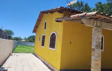 Imagem: A casa possui 4 Dormitórios, 4 Banheiros, 4 Vagas na garagem