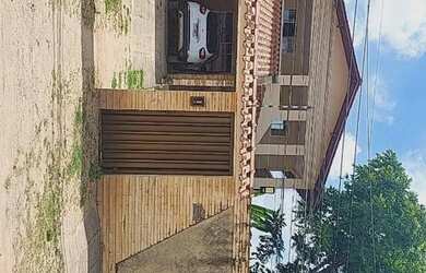 Imagem: A casa possui 4 Dormitórios, 4 Banheiros, 2 Vagas na garagem